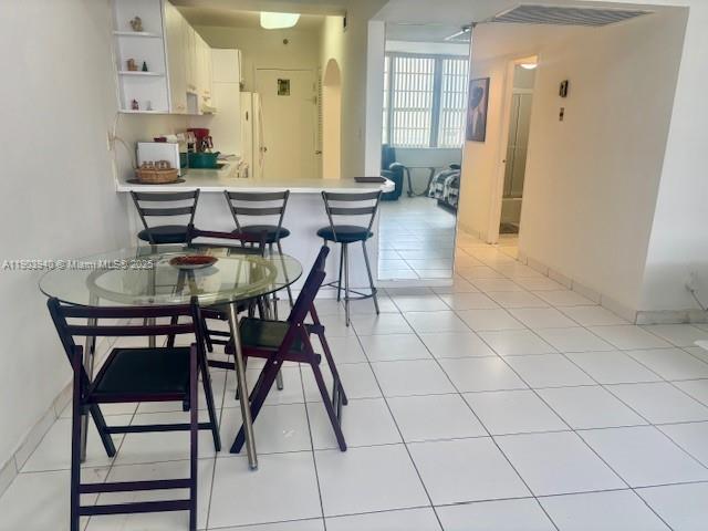 100 Lincoln Road, Unit 1030 Miami Beach, FL 33139 - Photo 4 of 35 a view of a dining room with furniture