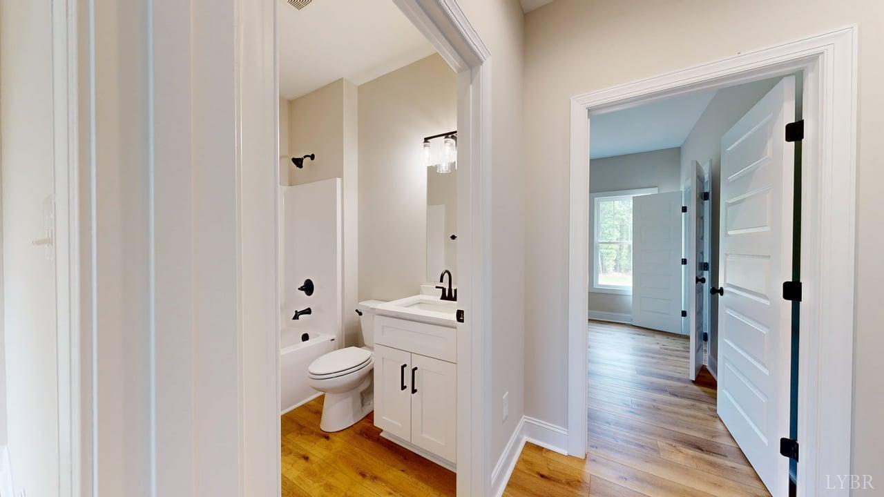3729 Kentuck Road Ringgold, VA 24586 - Photo 17 of 42 a bathroom with a sink and a toilet