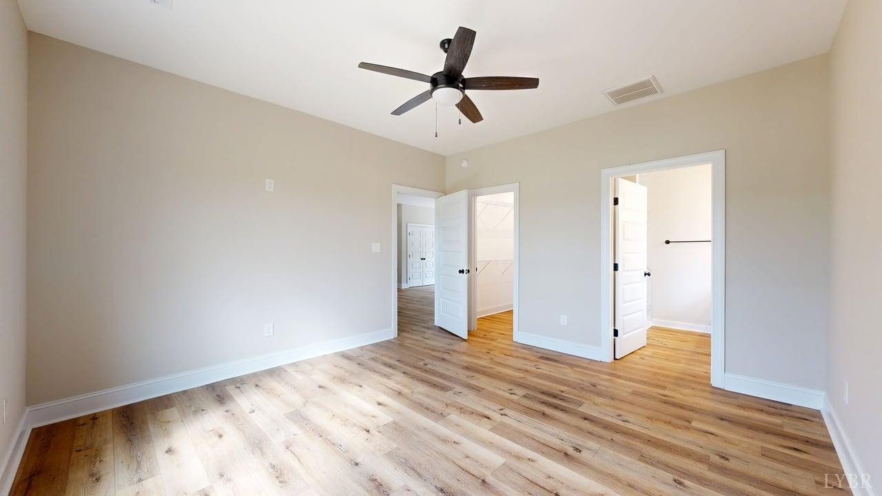 3729 Kentuck Road Ringgold, VA 24586 - Photo 21 of 42 a view of empty room with wooden floor