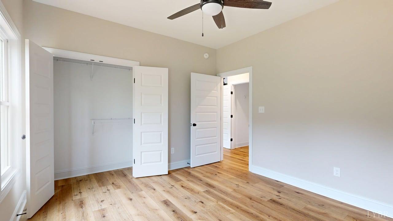 3729 Kentuck Road Ringgold, VA 24586 - Photo 30 of 42 a view of an empty room with wooden floor