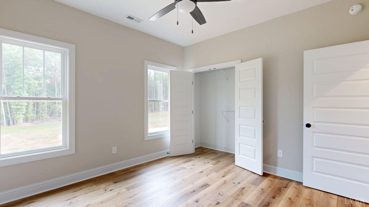 3729 Kentuck Road Ringgold, VA 24586 - Photo 31 of 42 a view of an empty room with wooden floor and a window