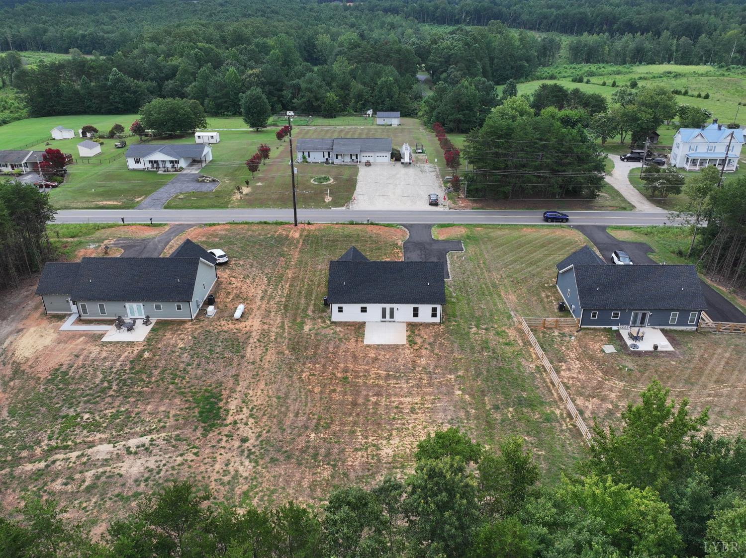 3729 Kentuck Road Ringgold, VA 24586 - Photo 40 of 42 an aerial view of a house with a yard basket ball court and outdoor seating
