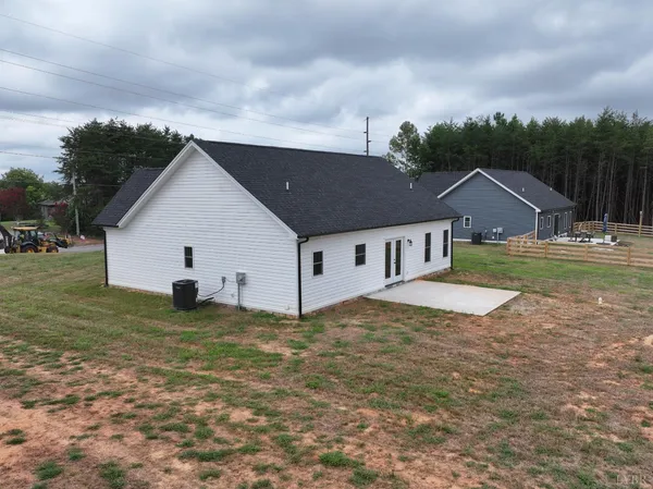 a house that has a big yard in front of it