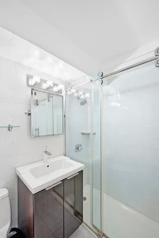a view of a hallway with washer and dryer