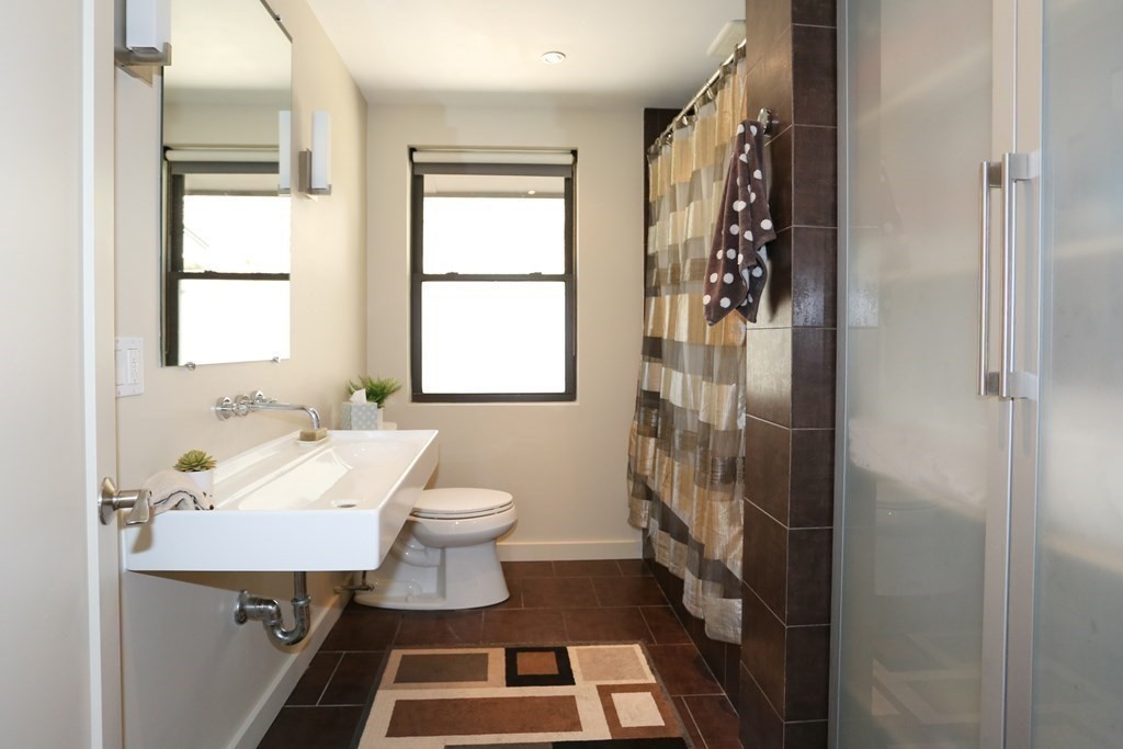 10 Country Corners Road Wayland, MA 01778 - Photo 16 of 32 a bathroom with a sink toilet and shower