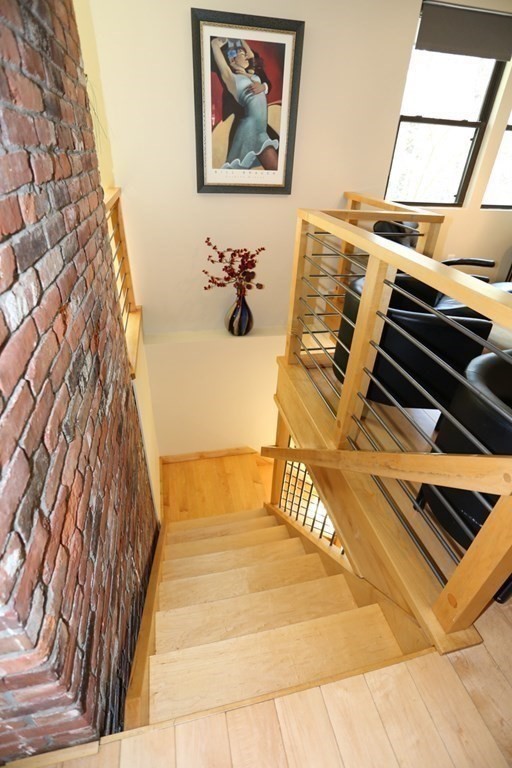10 Country Corners Road Wayland, MA 01778 - Photo 20 of 32 a bedroom with a bed and a painting on the wall