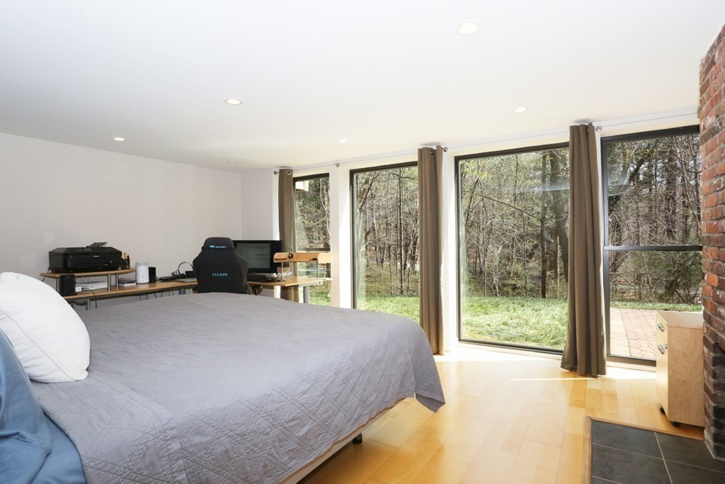 10 Country Corners Road Wayland, MA 01778 - Photo 24 of 32 a bed room with a bed and a television