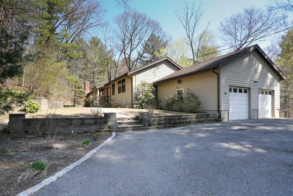 10 Country Corners Road Wayland, MA 01778 - Photo 30 of 32 a view of a house with a back yard