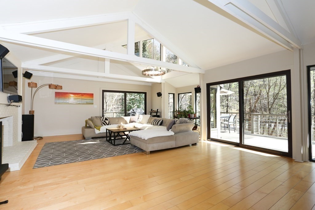 10 Country Corners Road Wayland, MA 01778 - Photo 3 of 32 a living room with furniture and large windows