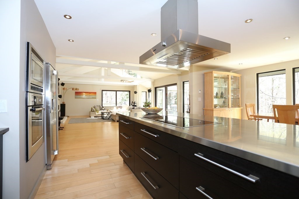 10 Country Corners Road Wayland, MA 01778 - Photo 9 of 32 a kitchen with stainless steel appliances granite countertop a sink and a refrigerator