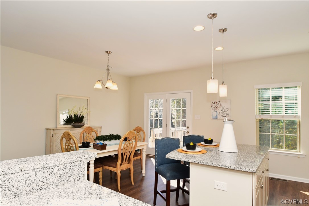 5509 Riverside Heights Way Richmond, VA 23225 - Photo 13 of 28 a view of a dining room with furniture