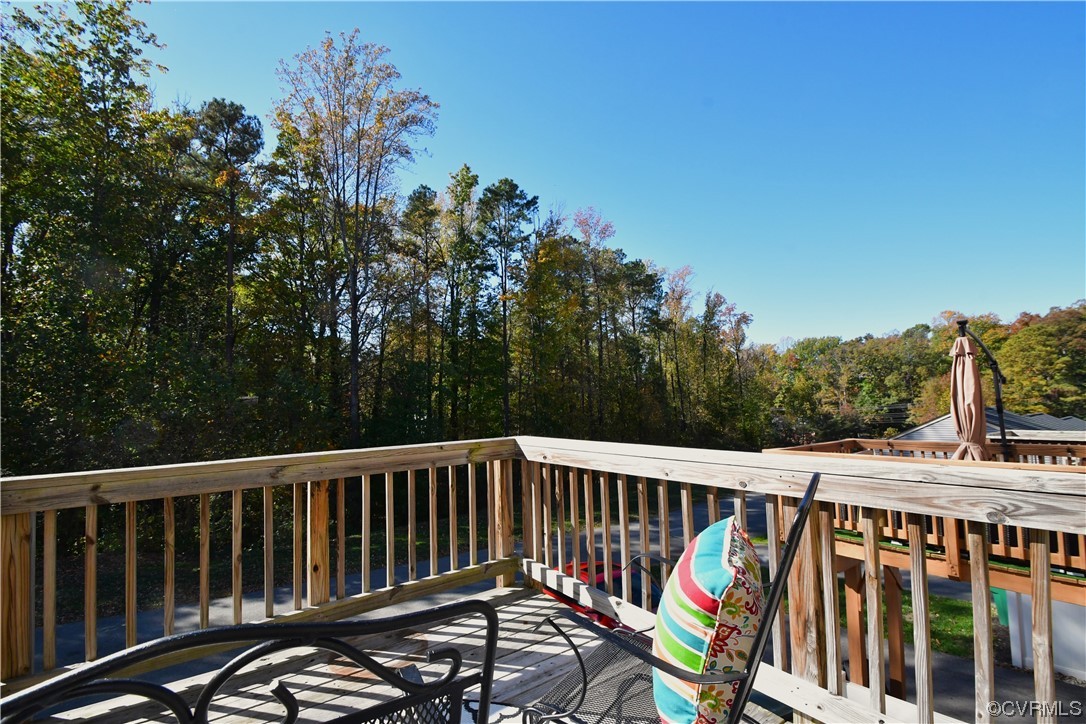 5509 Riverside Heights Way Richmond, VA 23225 - Photo 20 of 28 a view of a wooden roof deck