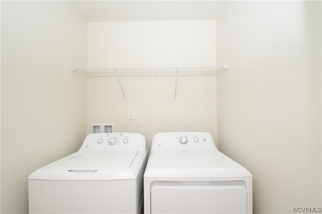 5509 Riverside Heights Way Richmond, VA 23225 - Photo 26 of 28 a utility room with dryer and washer