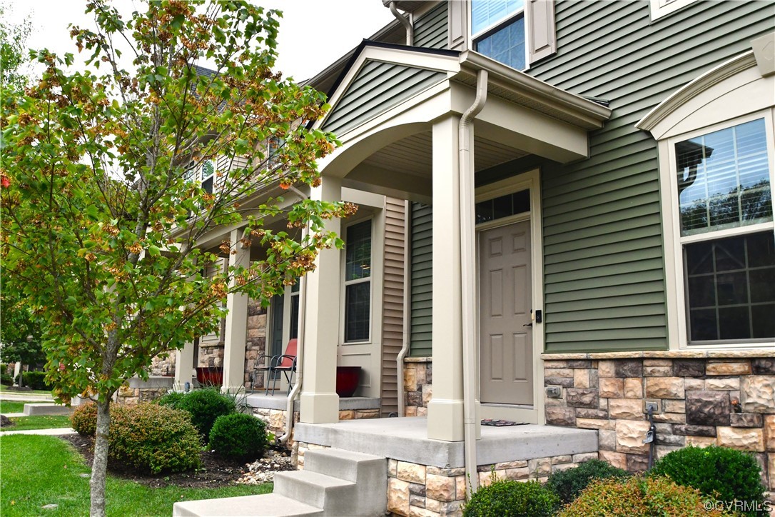 5509 Riverside Heights Way Richmond, VA 23225 - Photo 28 of 28 a front view of a house with a yard