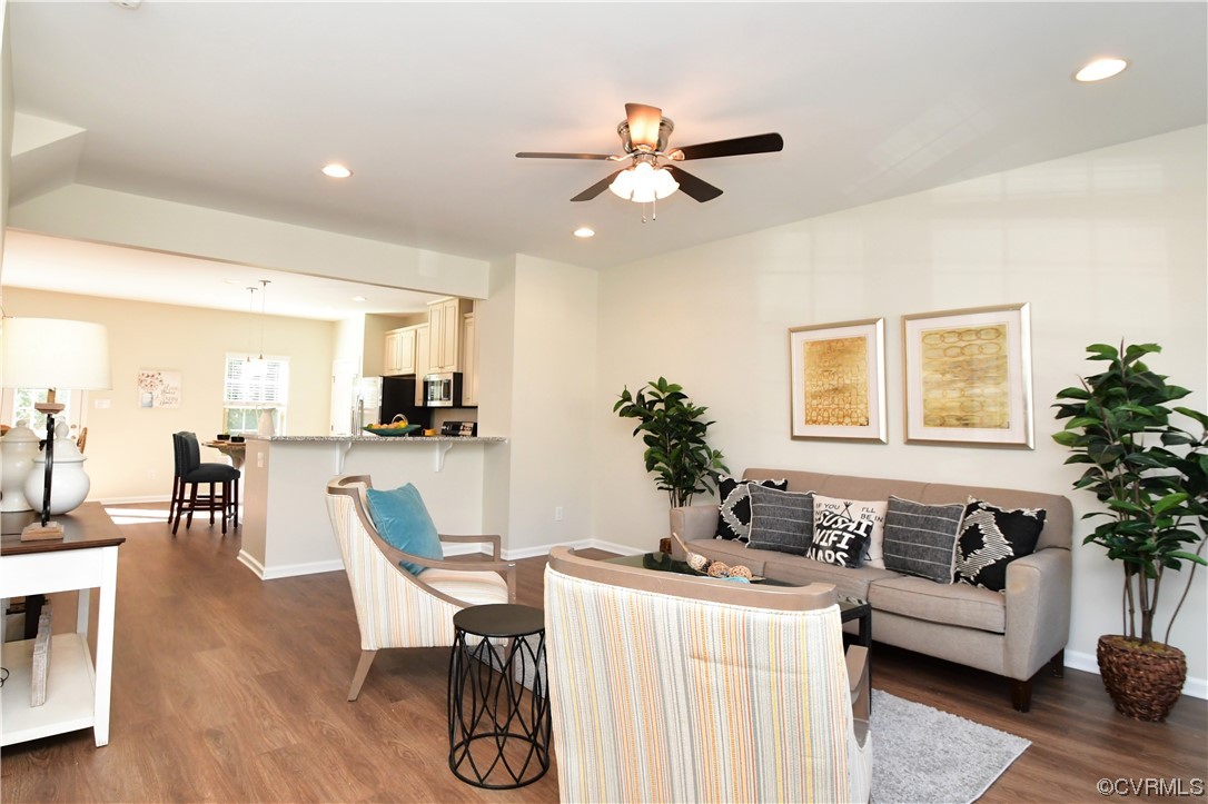 5509 Riverside Heights Way Richmond, VA 23225 - Photo 5 of 28 a living room with furniture and a large window