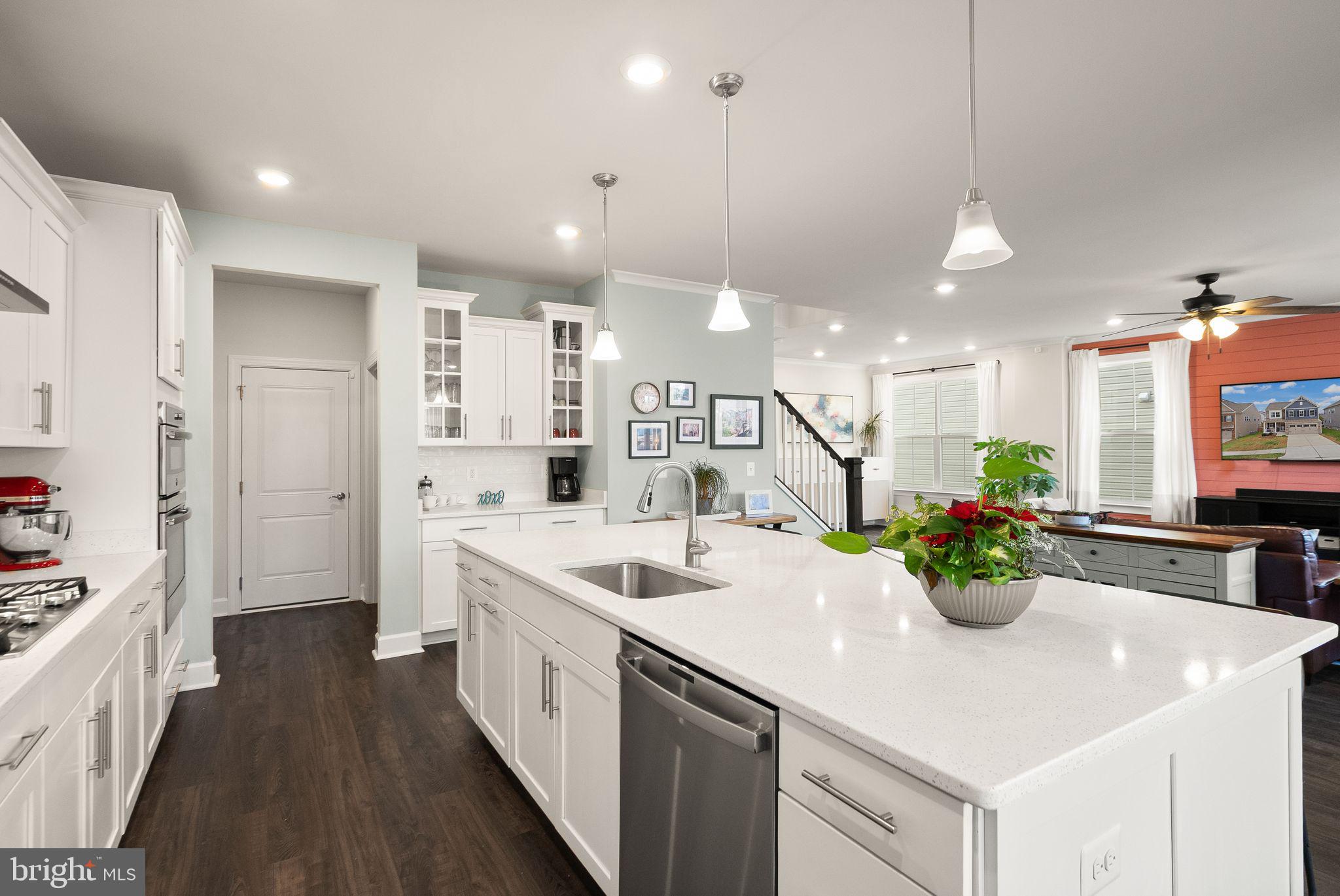 9516 Sanger Street Lorton, VA 22079 - Photo 11 of 45 a kitchen with sink and refrigerator