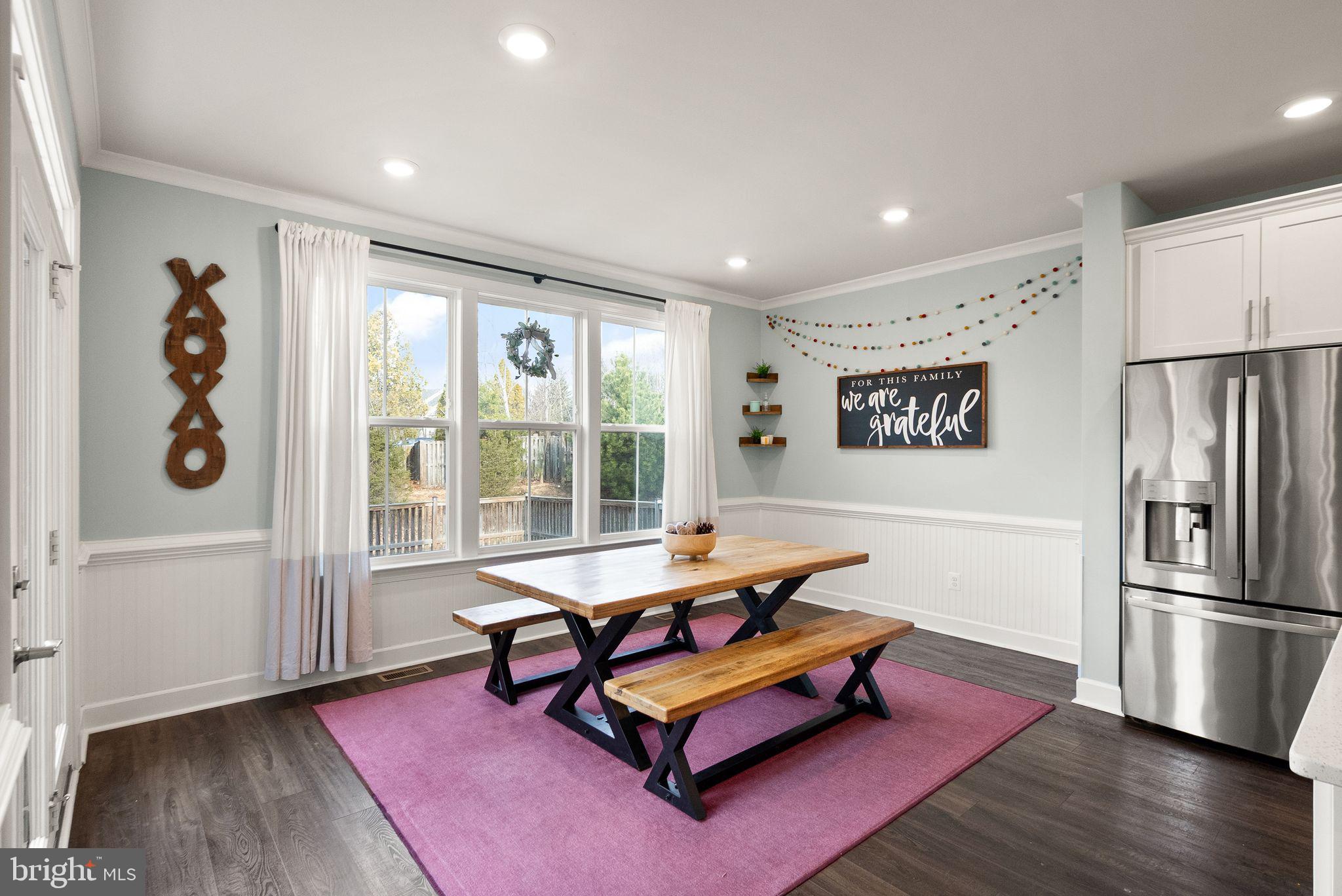 9516 Sanger Street Lorton, VA 22079 - Photo 12 of 45 a living room with furniture pool table and glass door