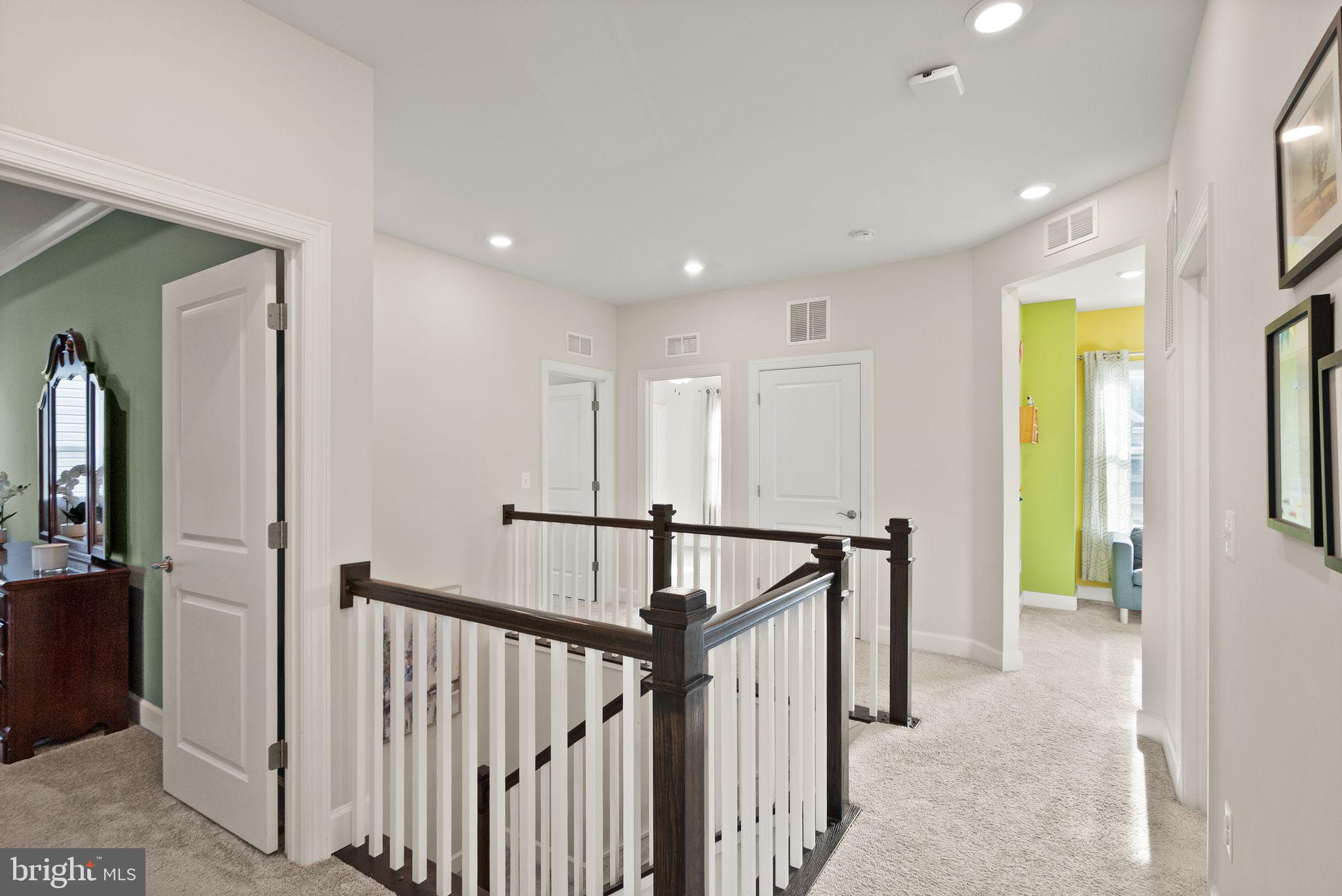 9516 Sanger Street Lorton, VA 22079 - Photo 17 of 45 a view of hallway with livingroom