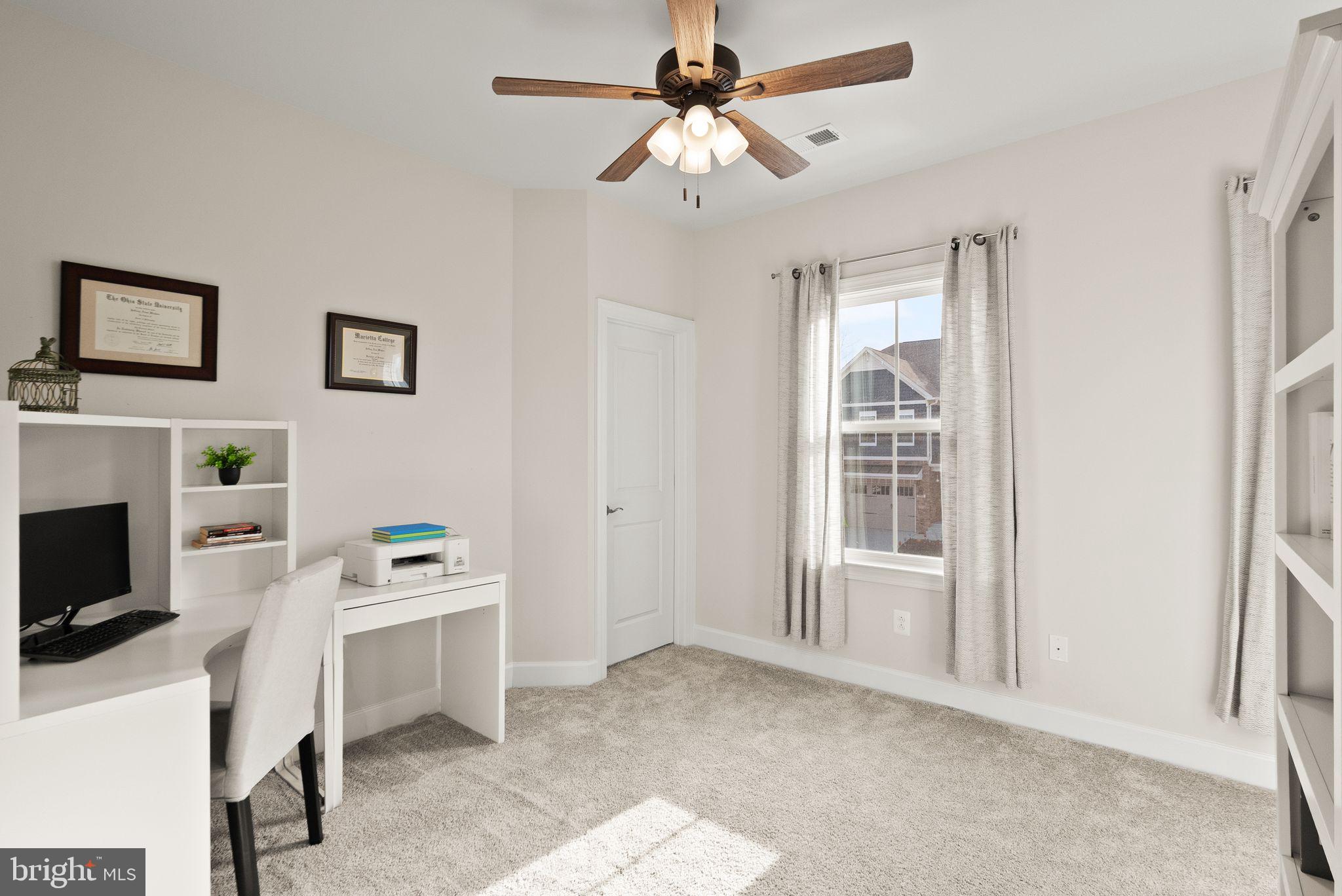 9516 Sanger Street Lorton, VA 22079 - Photo 26 of 45 a view of livingroom with furniture flat screen tv and outdoor space
