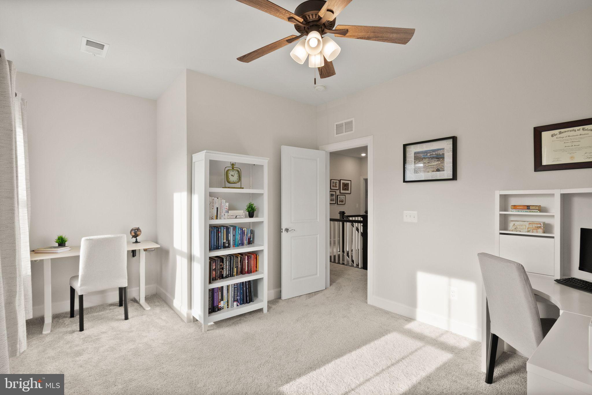 9516 Sanger Street Lorton, VA 22079 - Photo 27 of 45 a view of a livingroom with furniture and workspace