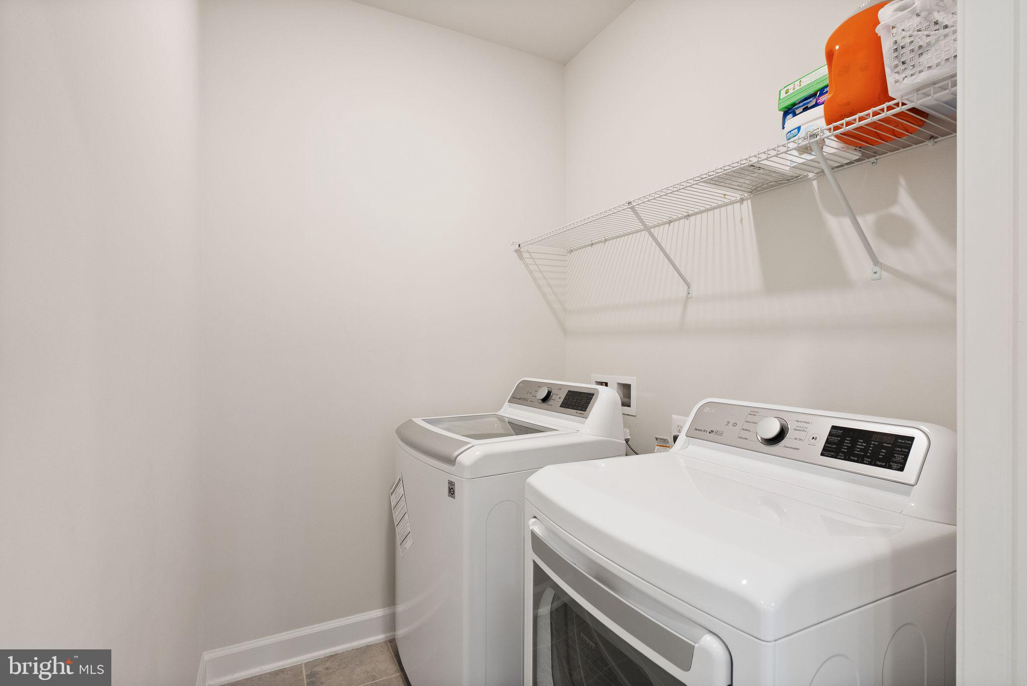 9516 Sanger Street Lorton, VA 22079 - Photo 33 of 45 a utility room with dryer and washer