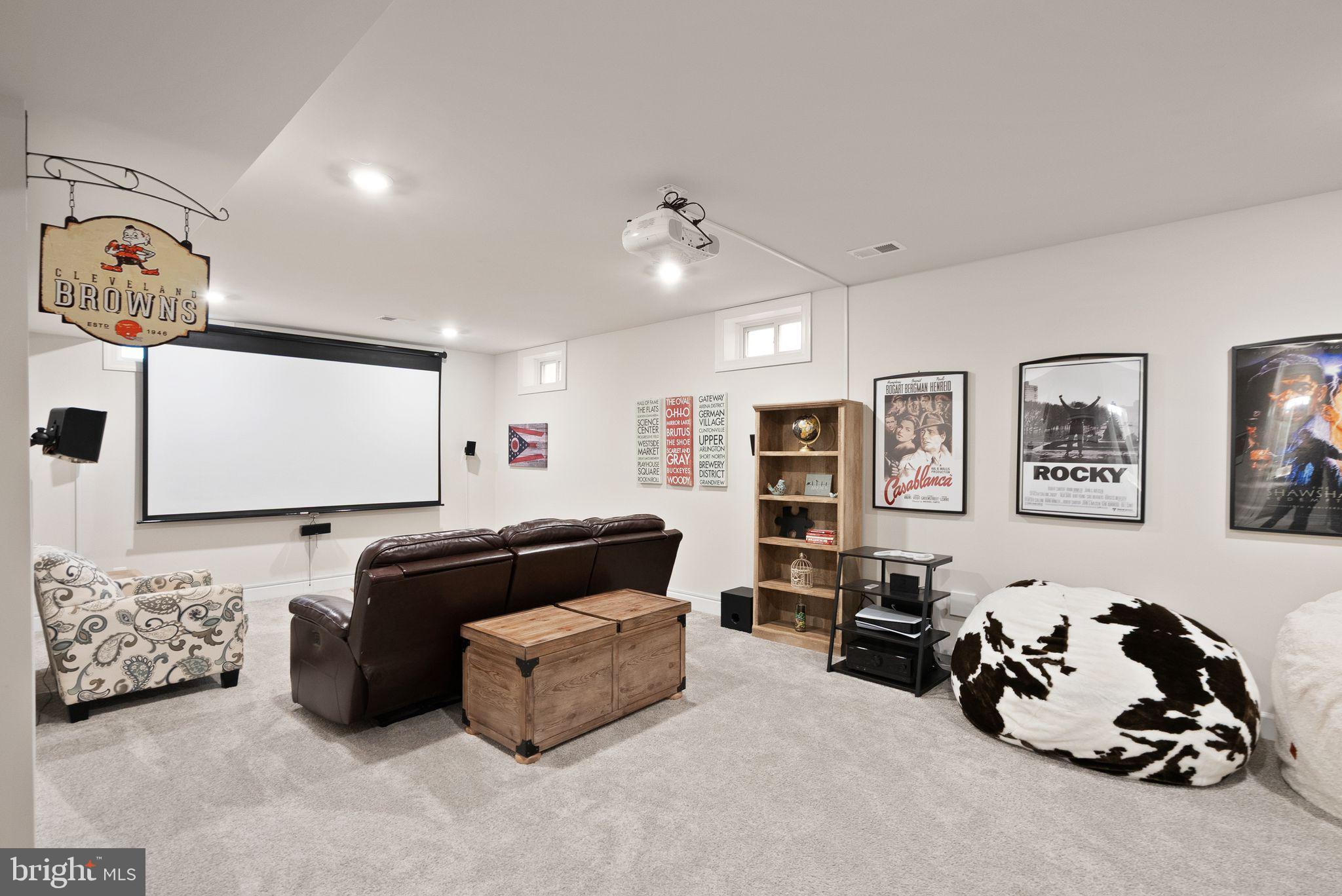 9516 Sanger Street Lorton, VA 22079 - Photo 35 of 45 a living room with furniture a couch and dresser