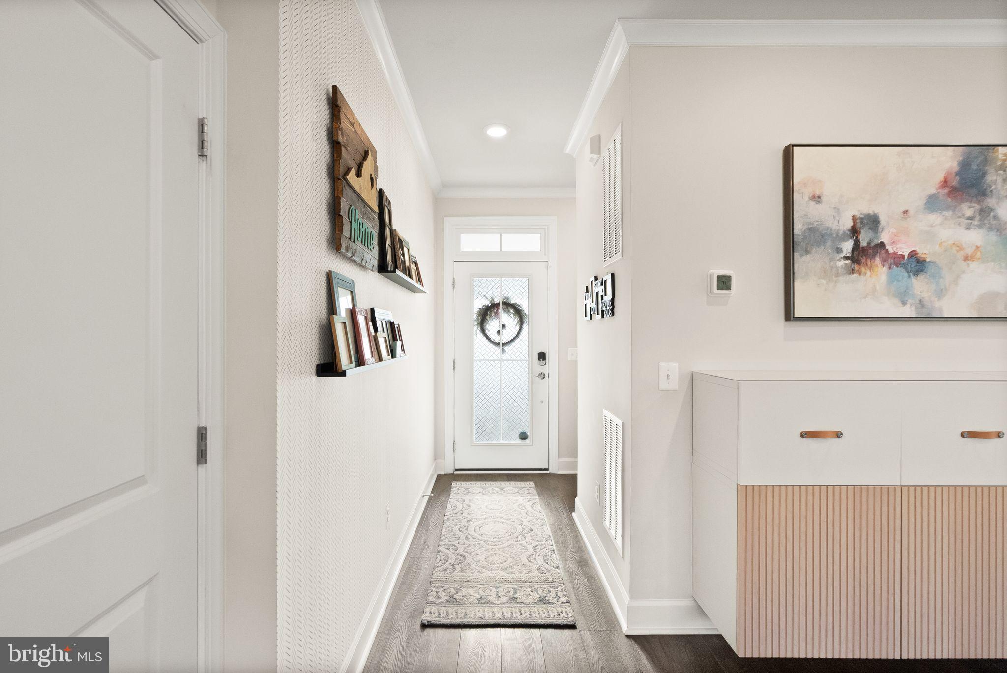9516 Sanger Street Lorton, VA 22079 - Photo 4 of 45 a view of a hallway with elevator
