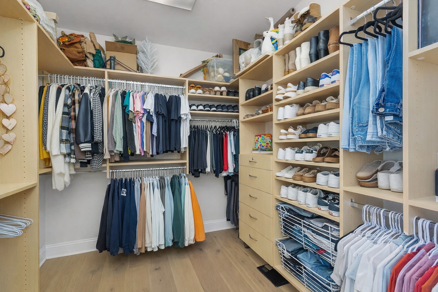 10004 Summer Ridge Lane Conroe, TX 77302 - Photo 33 of 50 a view of walk in closet with clothes and shoes