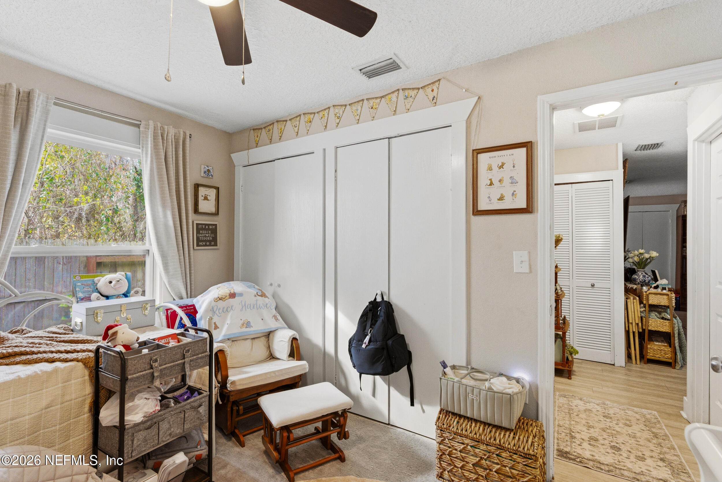 5188 Tan Street Jacksonville, FL 32258 - Photo 17 of 24 a living room with furniture and a window