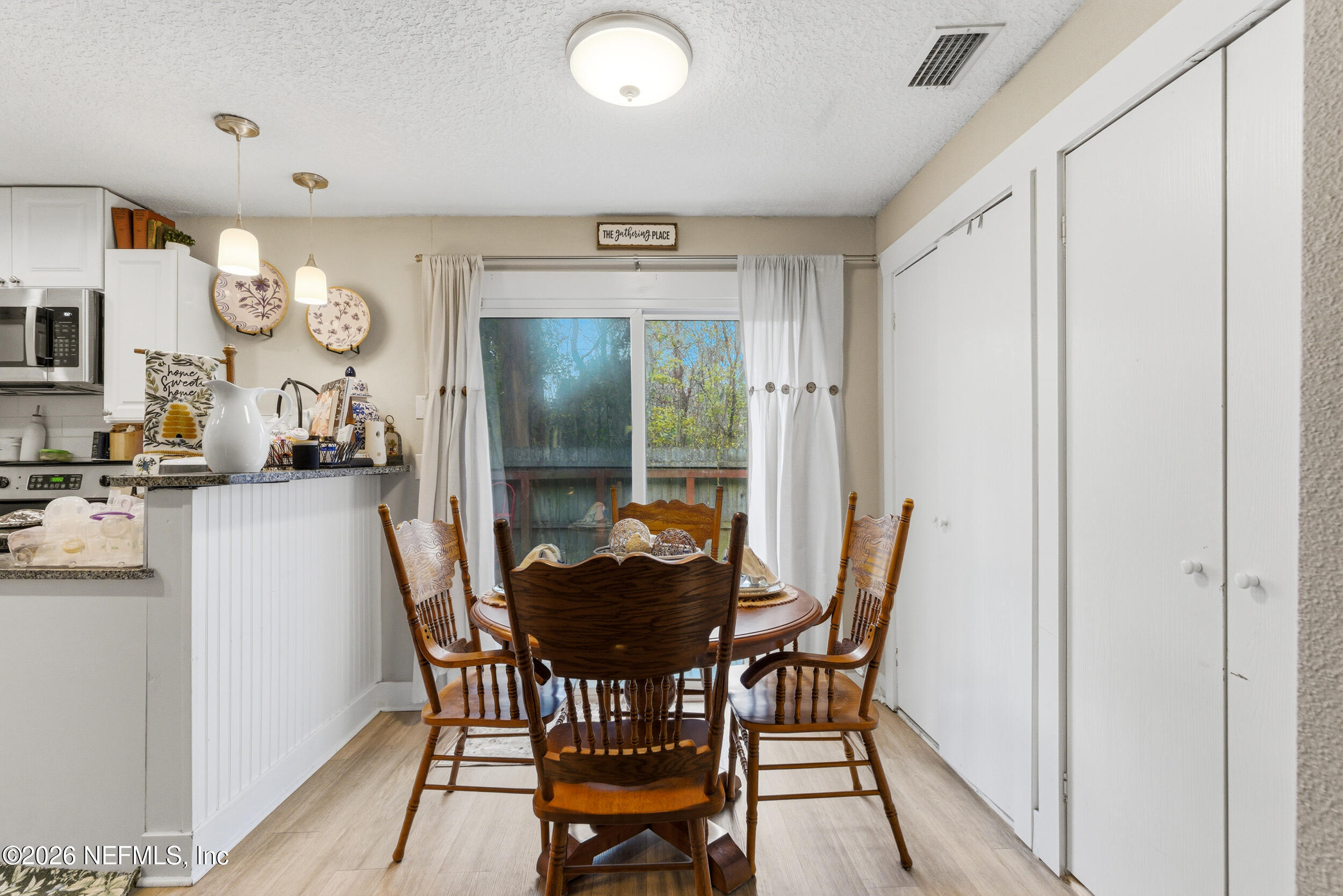 5188 Tan Street Jacksonville, FL 32258 - Photo 7 of 24 a dining room with furniture and window
