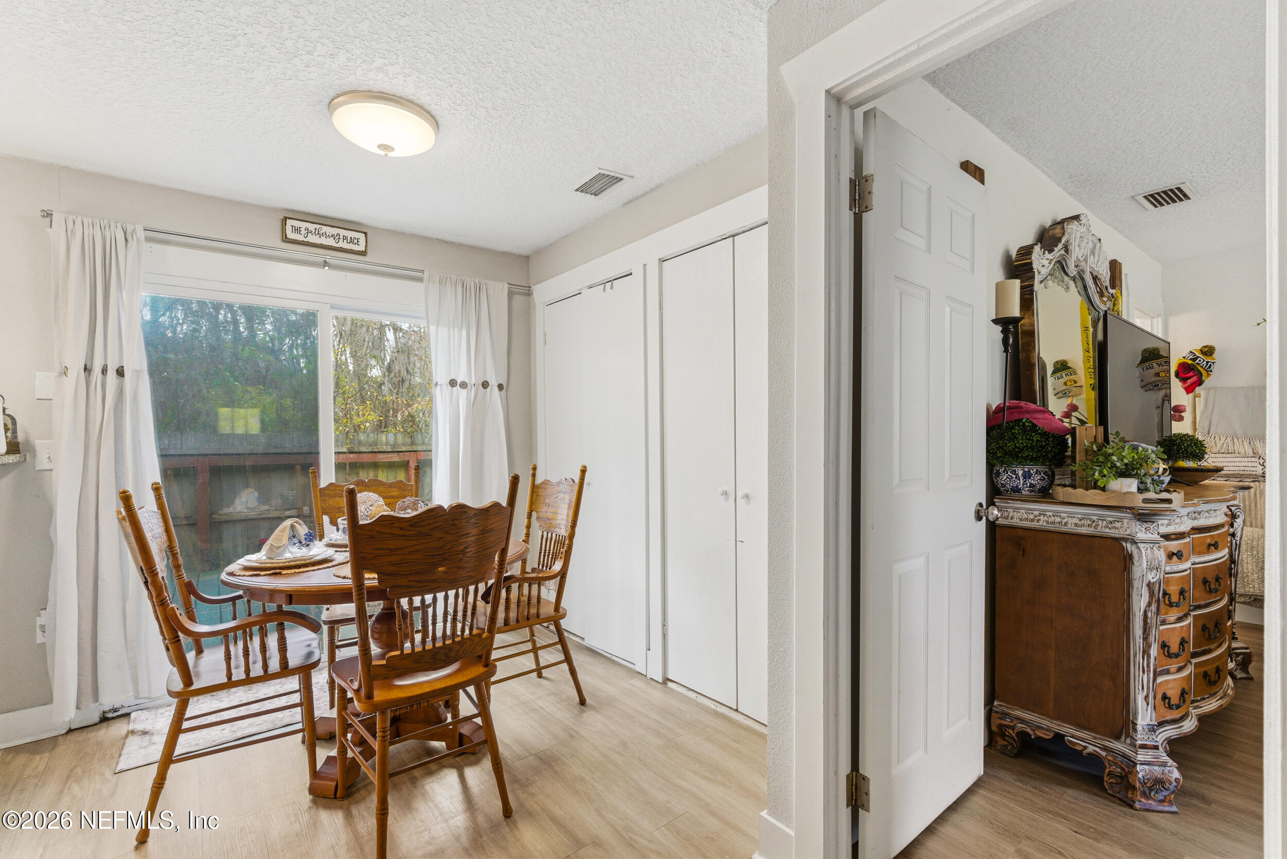 5188 Tan Street Jacksonville, FL 32258 - Photo 8 of 24 a view of a dining room with furniture window and outside view