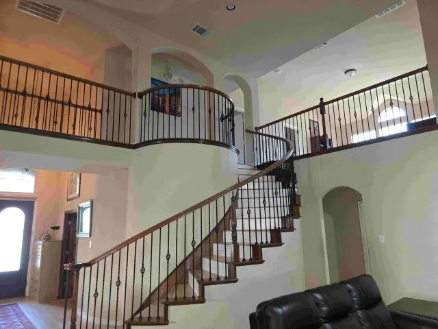 a view of entryway with wooden floor