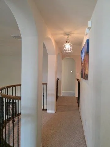 a view of a hallway with entryway