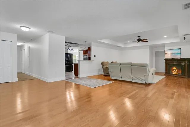 a view of a livingroom with furniture and a fireplace