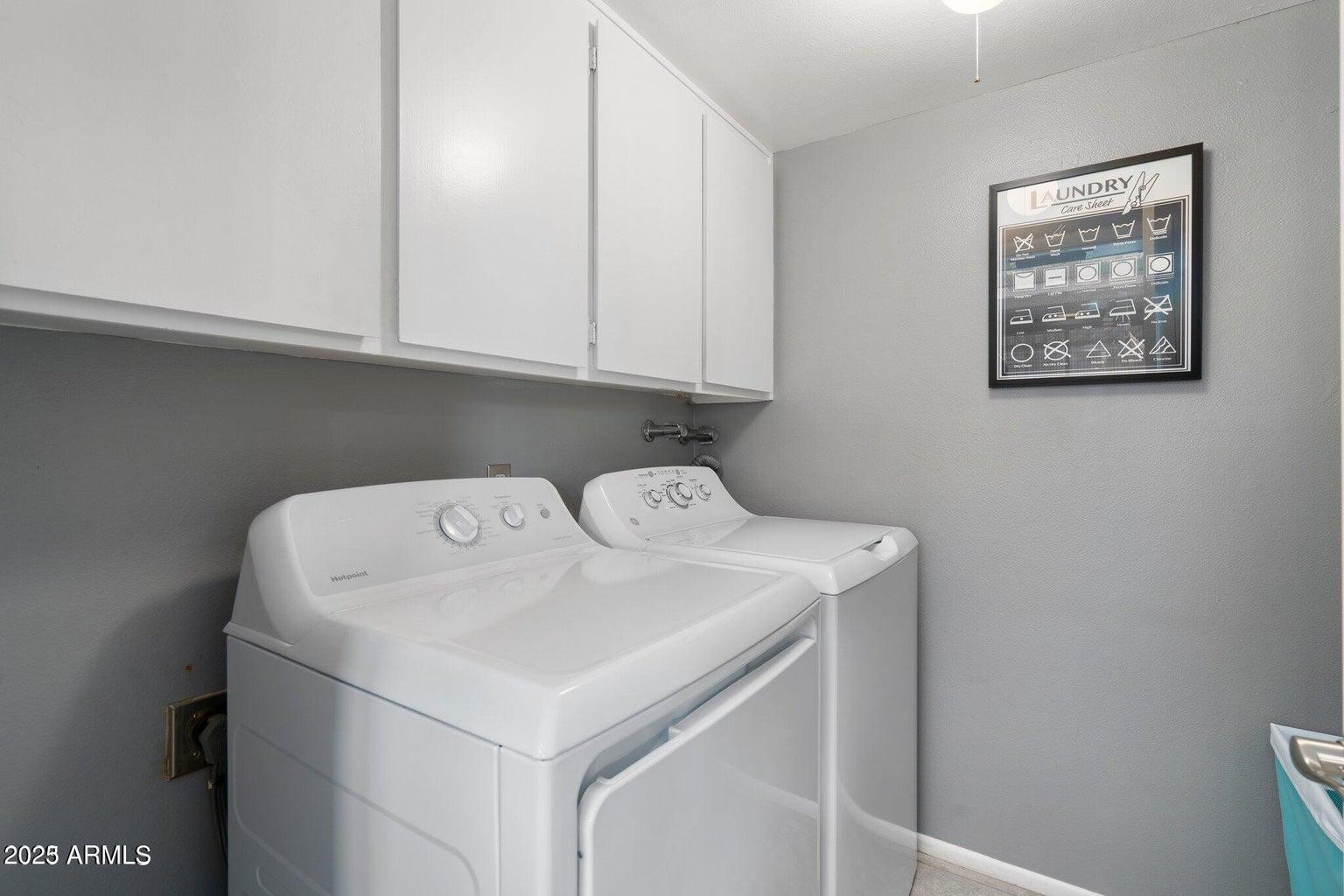 6921 East Osborn Road, Unit D Scottsdale, AZ 85251 - Photo 10 of 13 a utility room with dryer and washer