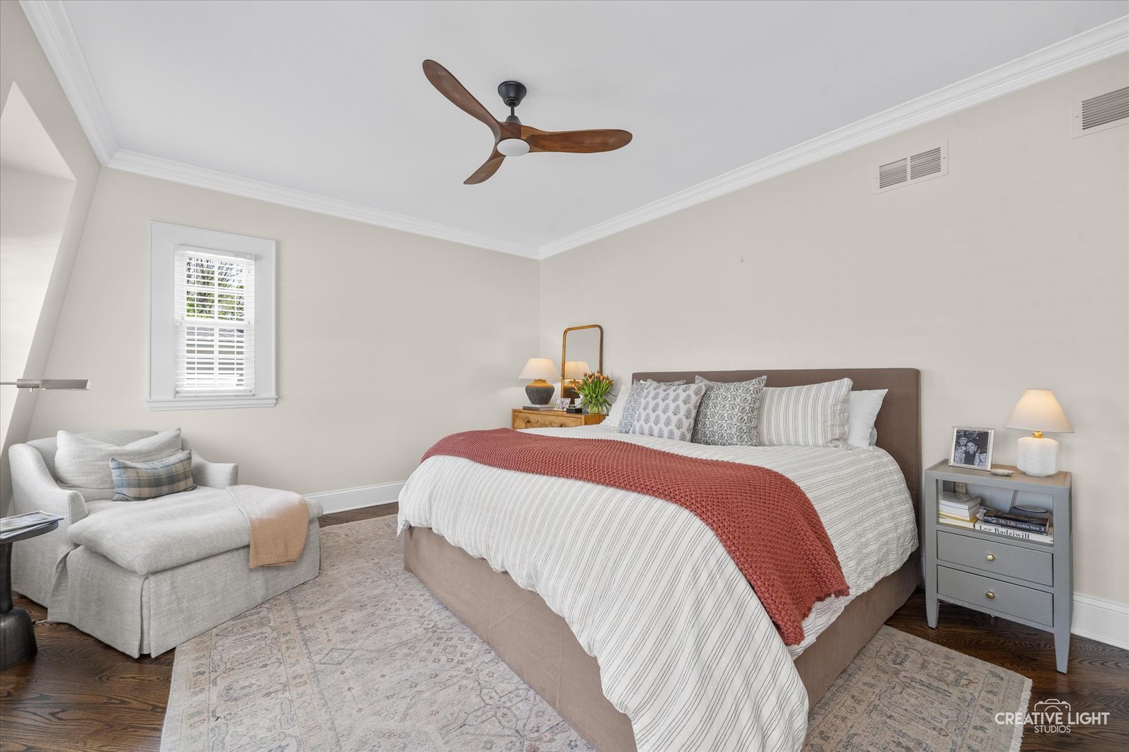 920 North Washington Street Wheaton, IL 60187 - Photo 20 of 43 a bedroom with a bed and wooden floor