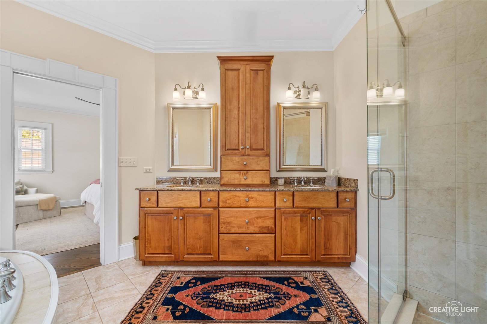 920 North Washington Street Wheaton, IL 60187 - Photo 22 of 43 a bathroom with a sink a toilet and mirror