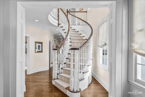 a view of entryway and hall with a hallway