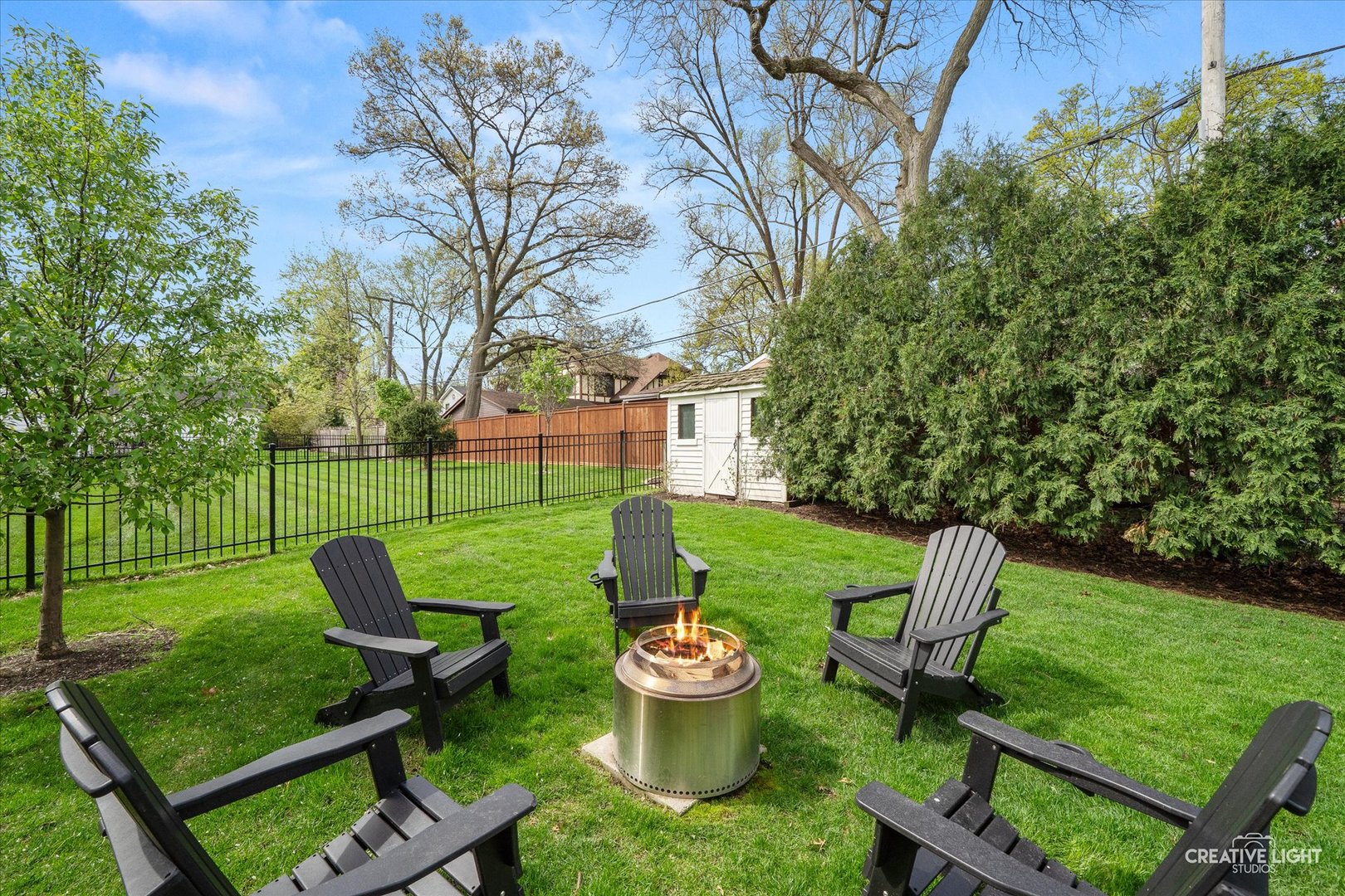 920 North Washington Street Wheaton, IL 60187 - Photo 42 of 43 a view of a backyard with sitting area and garden