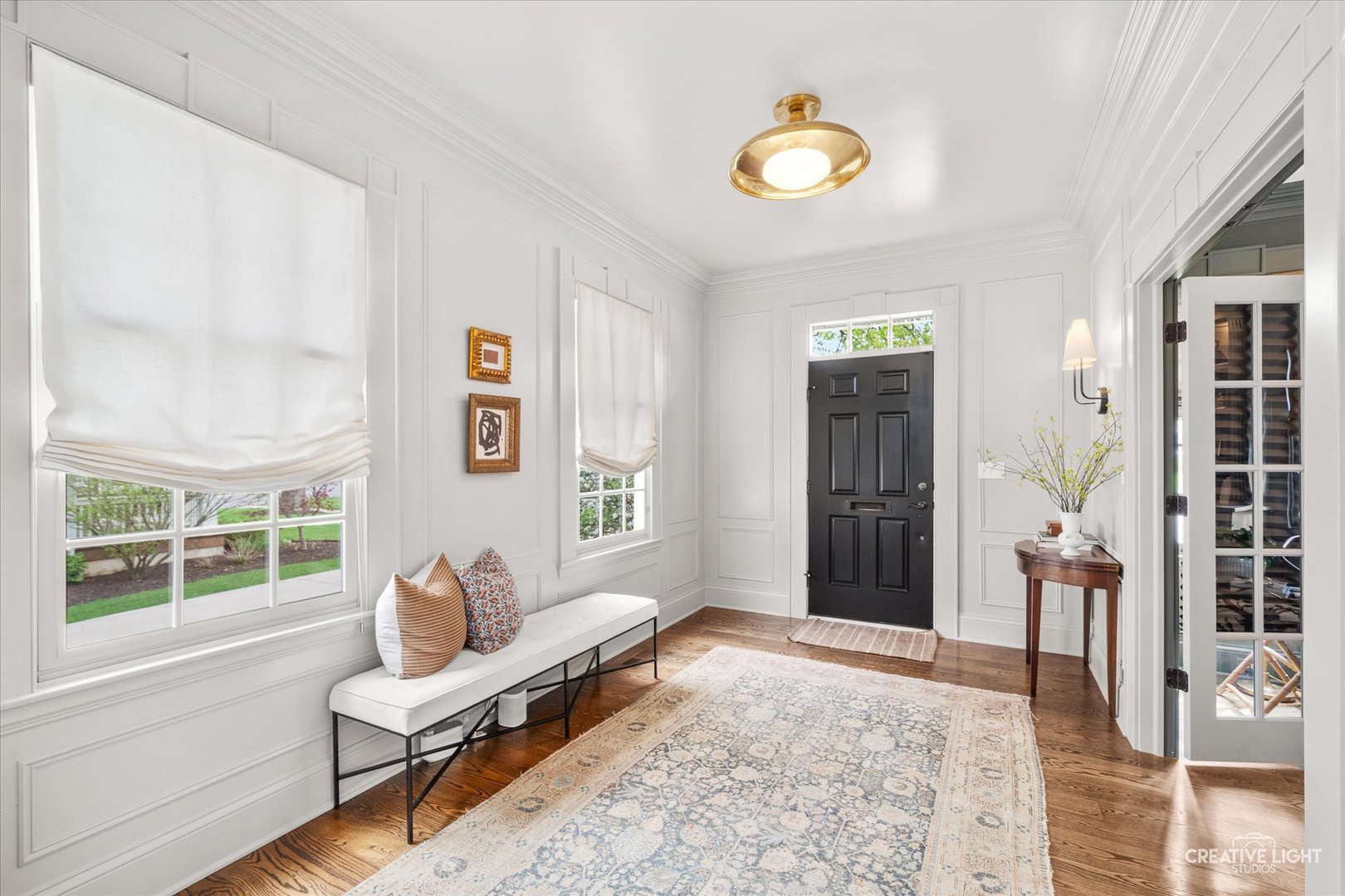 920 North Washington Street Wheaton, IL 60187 - Photo 6 of 43 a living room with furniture and a window