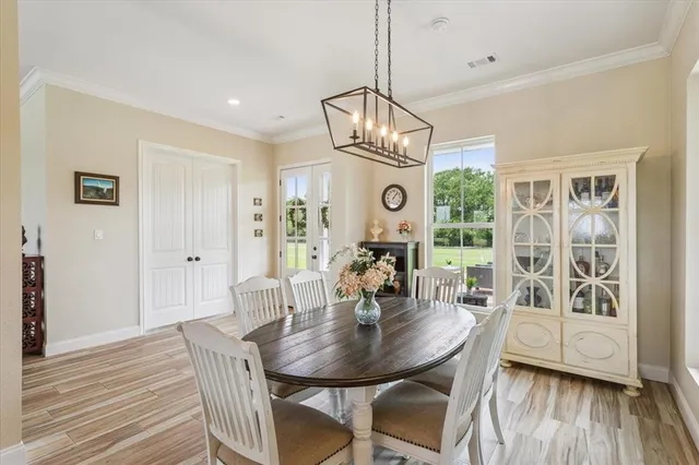 a living room with a fireplace a flat screen tv and a fireplace