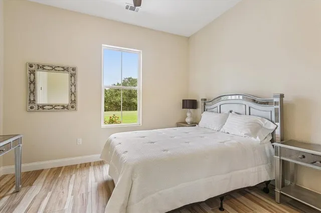 a front view of a house with a yard table and chairs