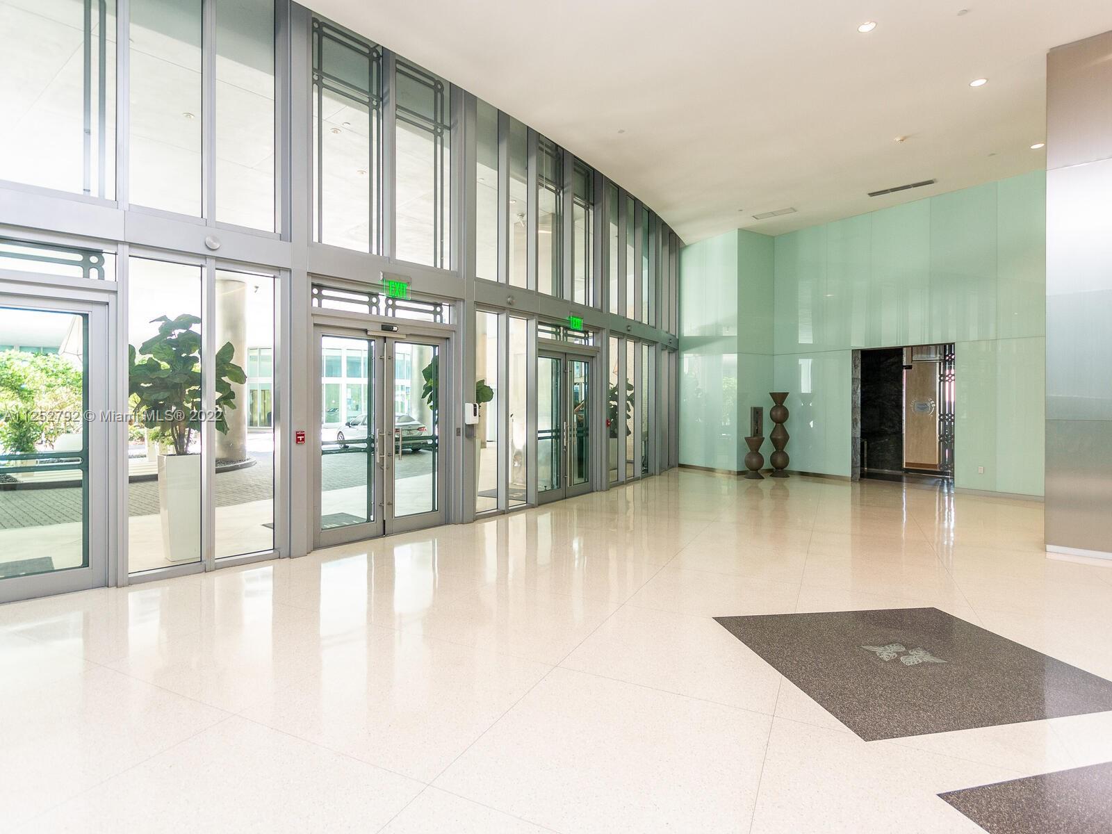 92 Southwest 3rd Street, Unit 1510 Miami, FL 33130 - Photo 5 of 90 a view of an entryway with a floor to ceiling window