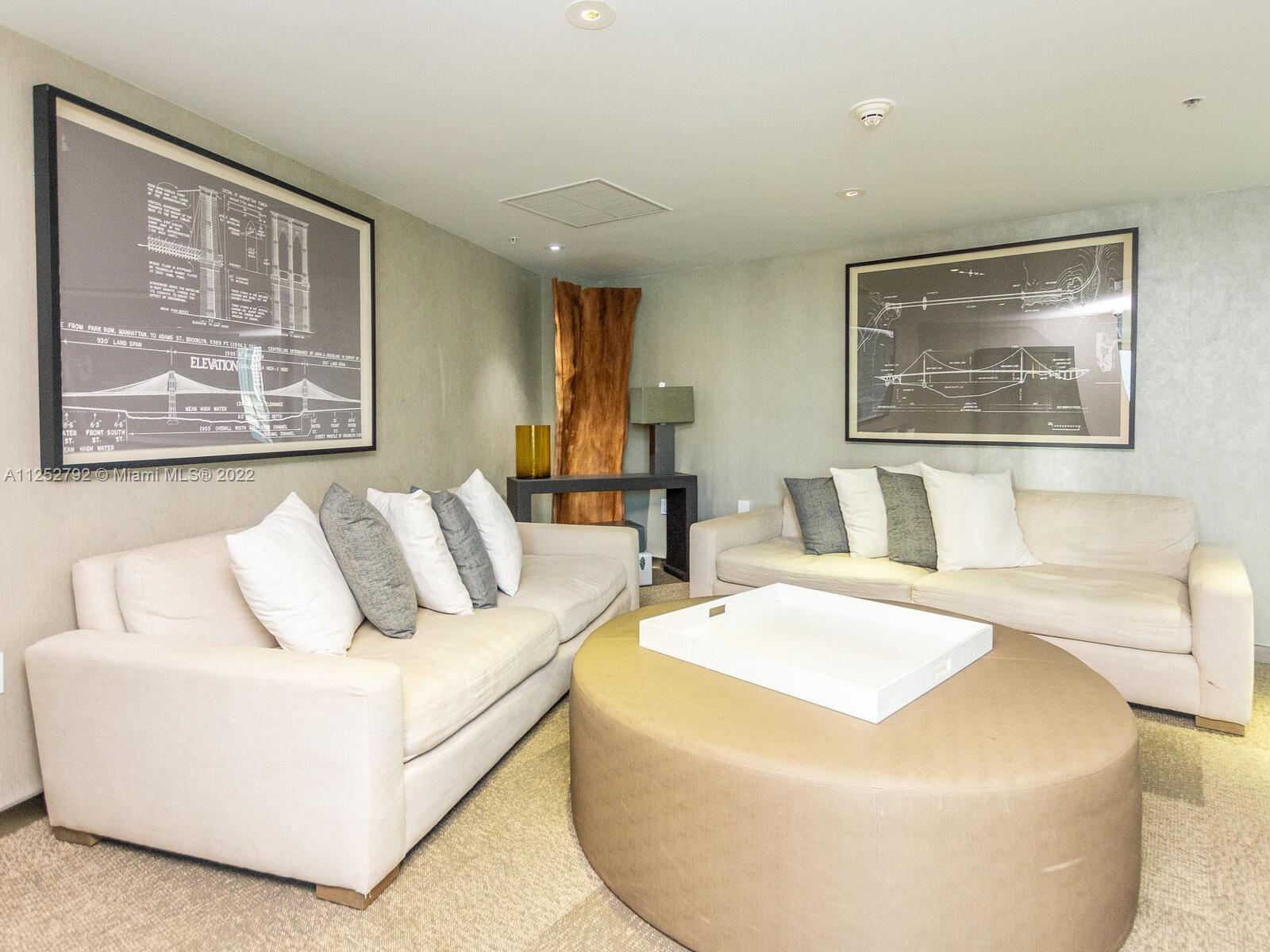 92 Southwest 3rd Street, Unit 1510 Miami, FL 33130 - Photo 59 of 90 a living room with furniture and a large window