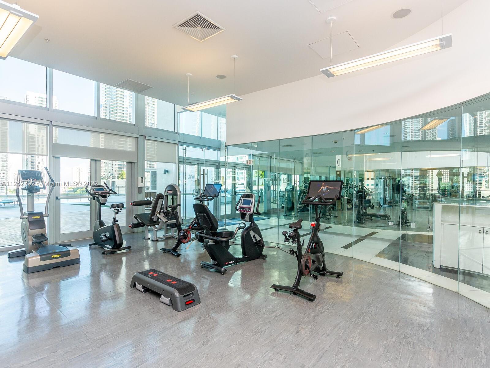 92 Southwest 3rd Street, Unit 1510 Miami, FL 33130 - Photo 61 of 90 a view of a room with gym equipment