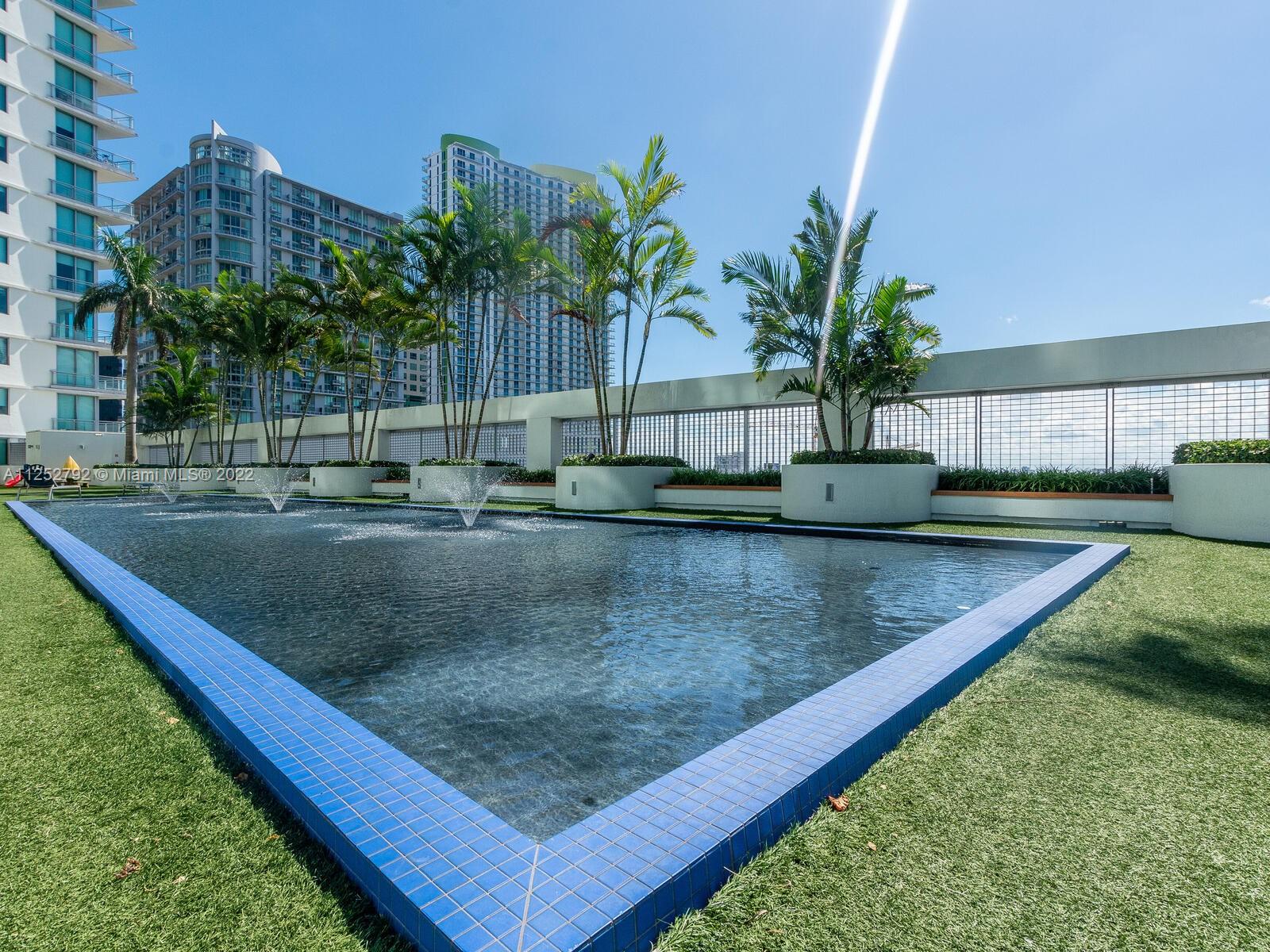 92 Southwest 3rd Street, Unit 1510 Miami, FL 33130 - Photo 66 of 90 a view of a backyard with plants