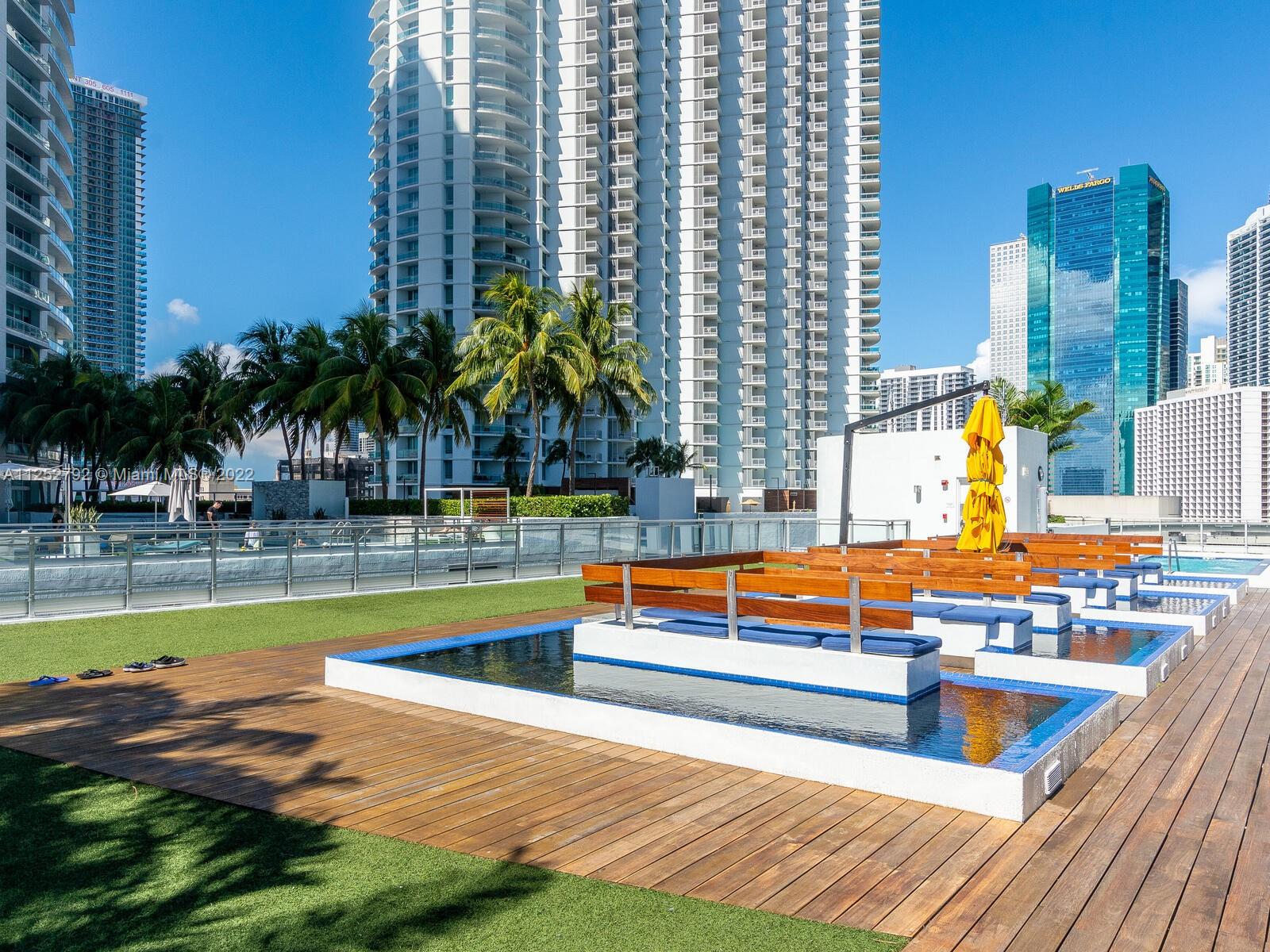 92 Southwest 3rd Street, Unit 1510 Miami, FL 33130 - Photo 68 of 90 a view of swimming pool with outdoor seating