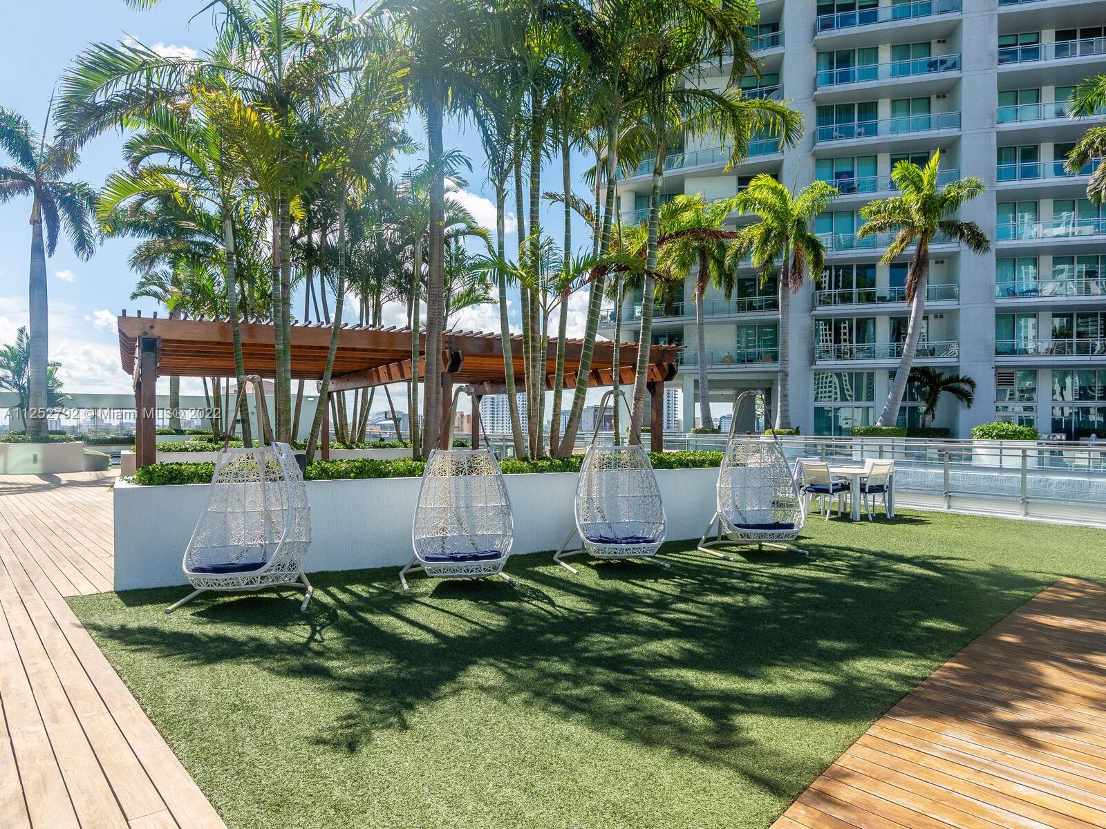 92 Southwest 3rd Street, Unit 1510 Miami, FL 33130 - Photo 77 of 90 a garden view with a seating space