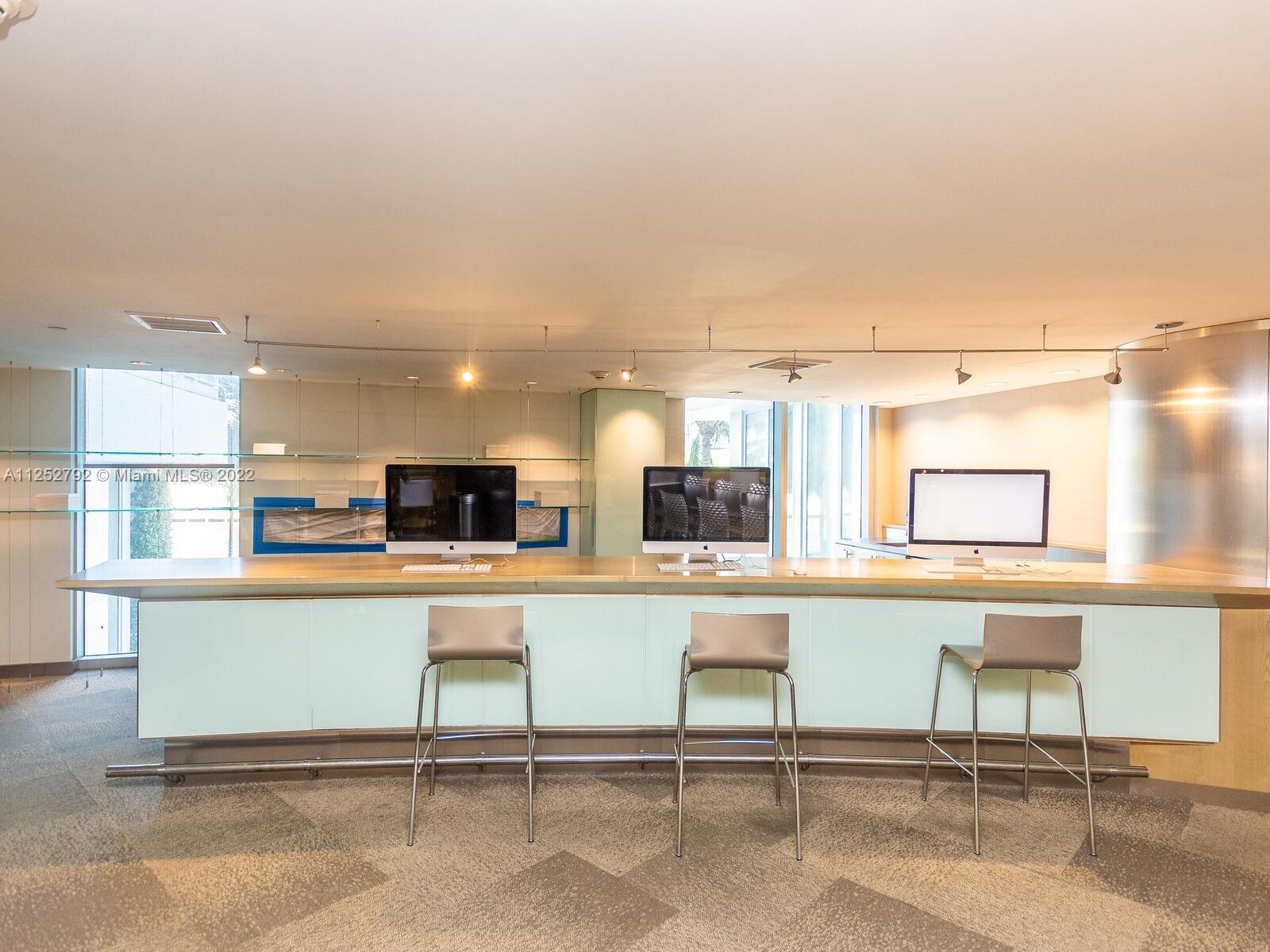 92 Southwest 3rd Street, Unit 1510 Miami, FL 33130 - Photo 88 of 90 a living room with stainless steel appliances kitchen island granite countertop furniture and a kitchen view