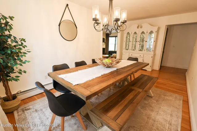 a bedroom with furniture and a toilet